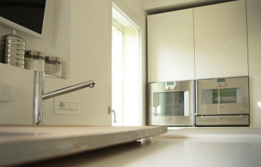 Colonne cucina con elettrodomestici Gaggenau.